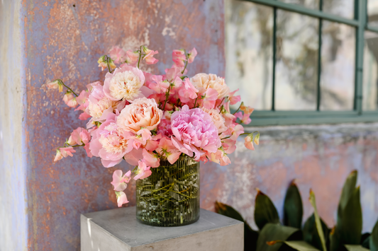 A flower arrangement to celebrate Mother's Day, Peaches and Pinks - featuring Peonies, Sweet Peas, and Garden Roses from Rose Story Farm  (Large size pictured)